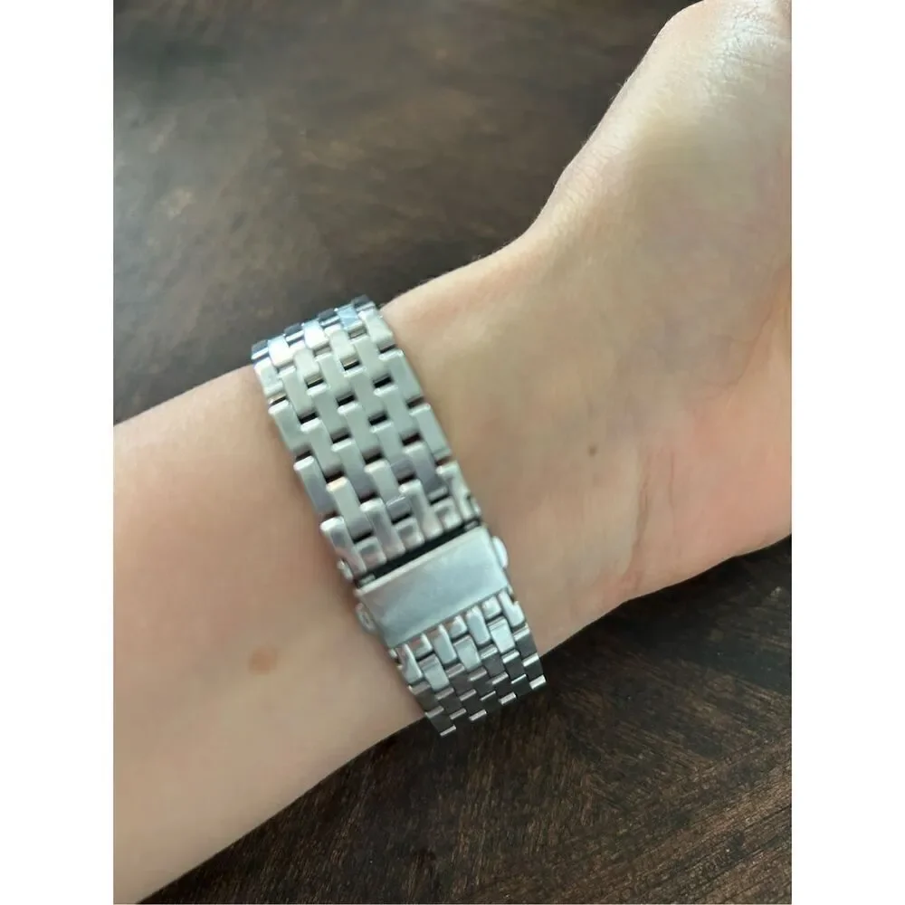Michael Kors silver color faux diamond watch fits a small wrist 5 inches laying